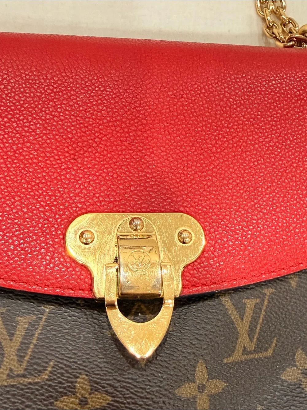Louis Vuitton Saint Placide brown monogram with red trim